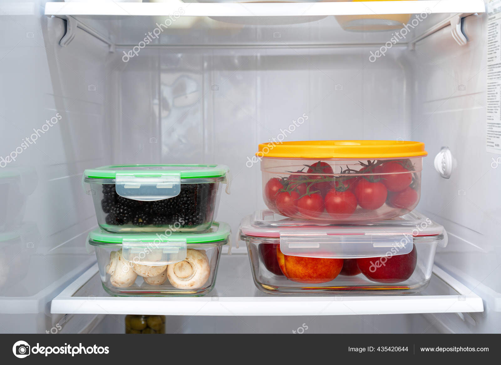 Storage containers with fresh food in a fridge Stock Photo by ©Fotofabrika  435420644